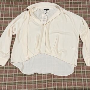 ASYMMETRIC PLEATED HEM SHIRT